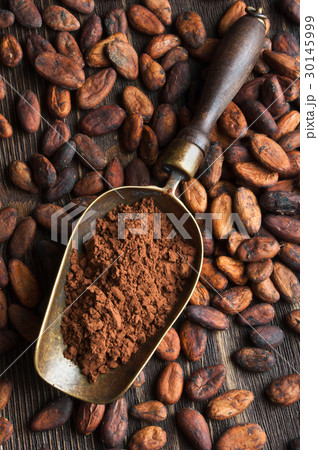 cocoa beans and retro scoop with cocoa powder 30145999