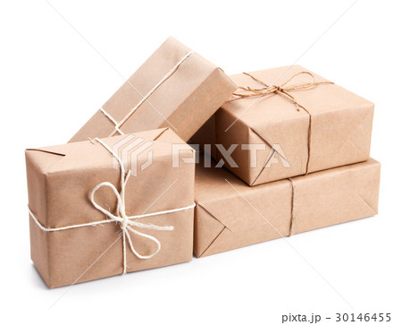 Group of parcel wrapped with brown packing paper 30146455