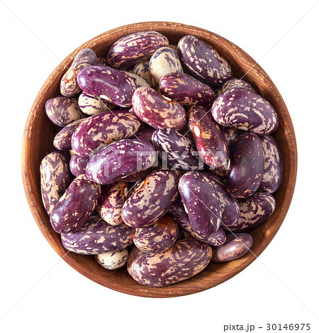 wooden bowl full of speckled beans isolated 30146975