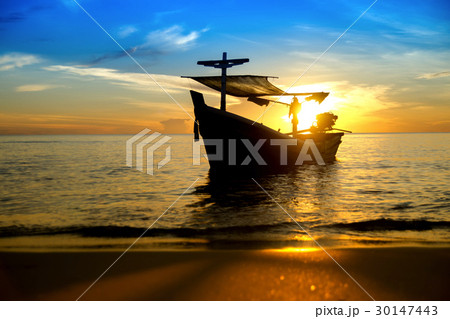 Silhouettes of Fishing boat on the beach. 30147443