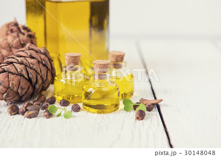 The cedar oil in a glass bottle The cedar oil in a glass bottle 30148048