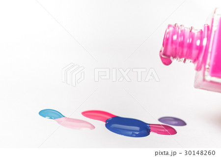 pink nail Polish and colorful drops isolated on 30148260