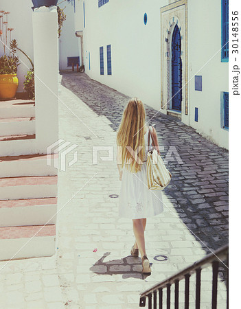 Woman walking in Sidi Bou Said. La Gulett, Tunisia 30148556