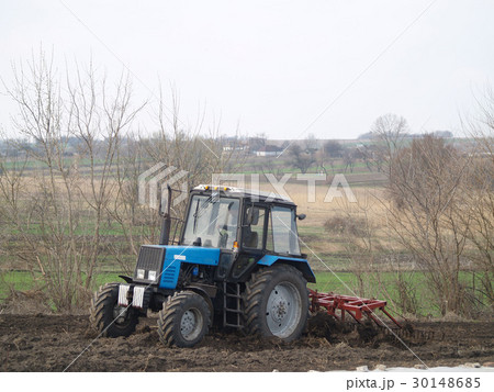 tractor in a field 30148685