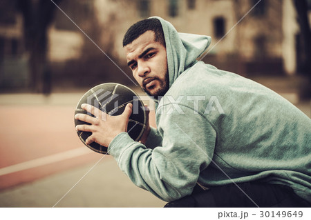 African-american streetball player resting African-american streetball player resting 30149649