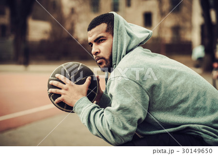 African-american streetball player resting African-american streetball player resting 30149650