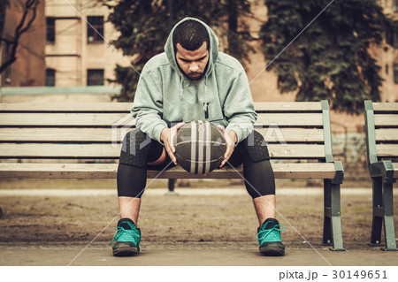 African-american streetball player resting African-american streetball player resting 30149651