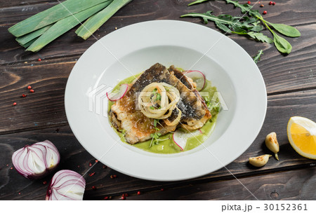 carp fillet with cream of celery and lemon sauce 30152361