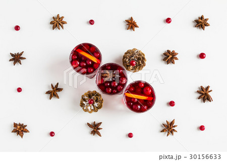 Mulled wine in small glasses with cranberries Mulled wine in small glasses with cranberries 30156633