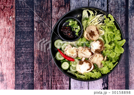 Boiled fresh bamboo mushroom and vegetable . 30158898