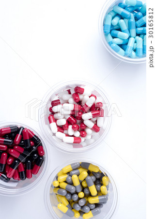 pile of medical pills and pills on background. pile of medical pills and pills on background. 30165812
