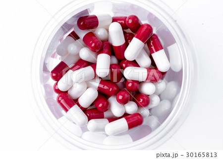 pile of medical pills and pills on background. pile of medical pills and pills on background. 30165813