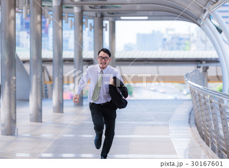businessman in a hurry and running  late for work 30167601