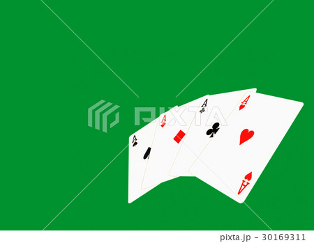 Four aces on green casino background. 30169311