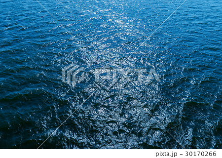 aerial view to blue water with sun reflections aerial view to blue water with sun reflections 30170266