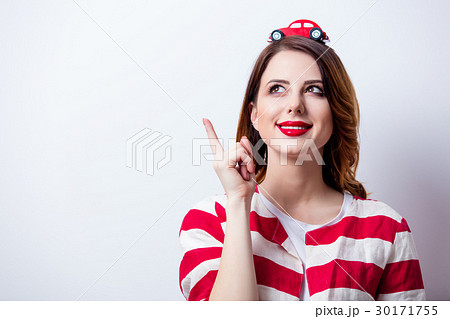 young woman with car shaped toy young woman with car shaped toy 30171755