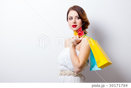 young woman with colorful shopping bags young woman with colorful shopping bags 30171784