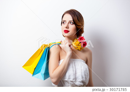 young woman with colorful shopping bags young woman with colorful shopping bags 30171785