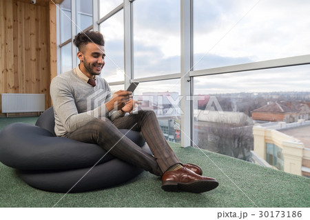 Business Man Using Cell Smart Phone Sit In Front Business Man Using Cell Smart Phone Sit In Front 30173186