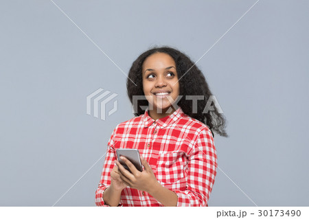 Young Woman Using Cell Smart Phone African Young Woman Using Cell Smart Phone African 30173490