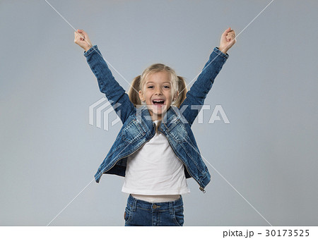 Excited Little Teenage Girl Hold Hands Up, Small 30173525