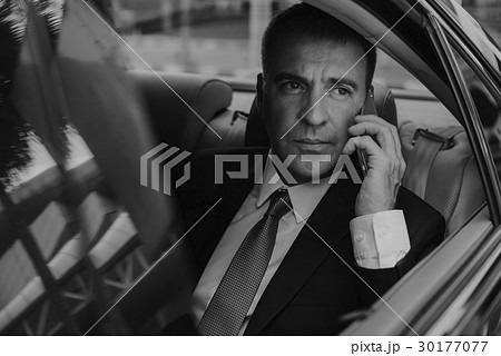 Businessman Talking Using Phone Car Inside 30177077