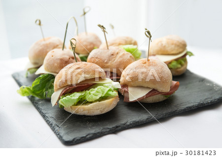Mini sandwiches with salad, cheese, bacon, salami 30181423