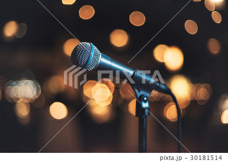 Microphone on stage against a background concert Microphone on stage against a background concert 30181514