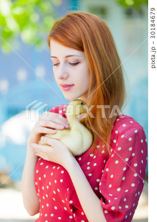 portrait of beautiful young woman with duck 30184679
