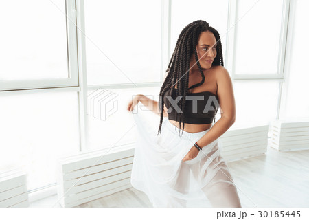 Enigmatic passionate woman performing a dance 30185445