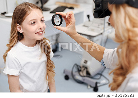 Scrupulous specialist indicating eye problems 30185533