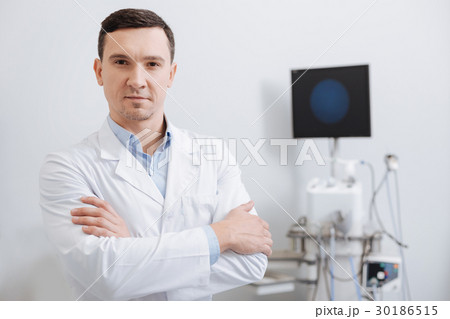 Confident doctor looking straight at camera 30186515
