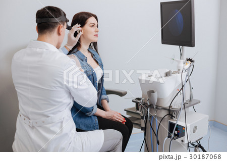 Side view of medical examination leading be ENT 30187068