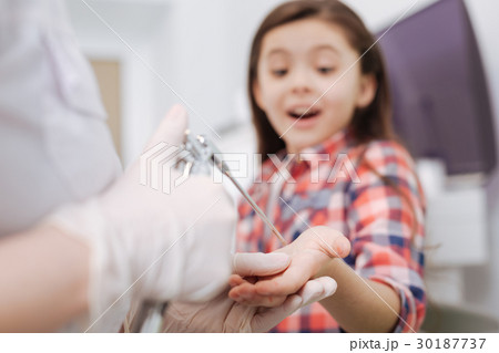doctor preparing little patient for examination 30187737