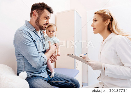Family doctor asking some questions 30187754