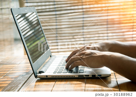 working on laptop. working on laptop. 30188962
