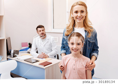 Attractive mother posing with her daughter 30189134