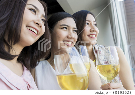 Ladies are enjoying champagne in a luxury restaurant 30193623