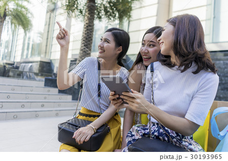 Women are discussing about new ideas together. Women are discussing about new ideas together. 30193965