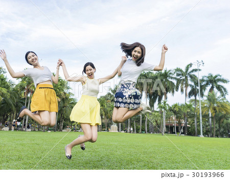 Photo of dynamic ladies jumping and selfie. Photo of dynamic ladies jumping and selfie. 30193966