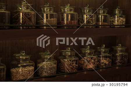 Arrangement of dry food products on wooden shelves Arrangement of dry food products on wooden shelves 30195794