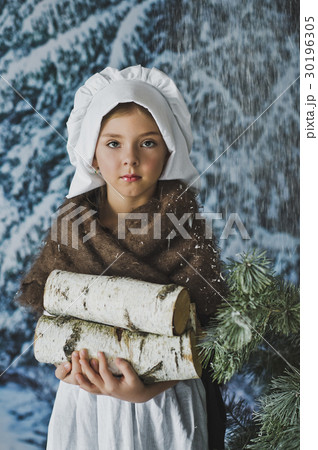 Little girl in the winter forest collect firewood 4842. Little girl in the winter forest collect firewood 4842. 30196305