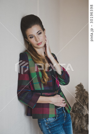 The girl leaned against the wall 4864. The girl leaned against the wall 4864. 30196398