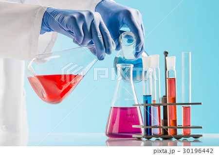 Experiments in a chemistry lab. conducting an Experiments in a chemistry lab. conducting an 30196442