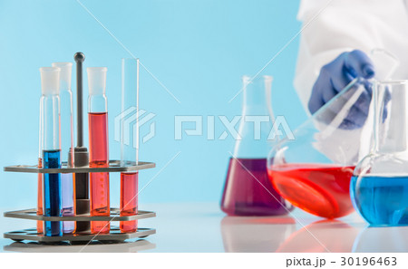 Experiments in a chemistry lab. conducting an Experiments in a chemistry lab. conducting an 30196463