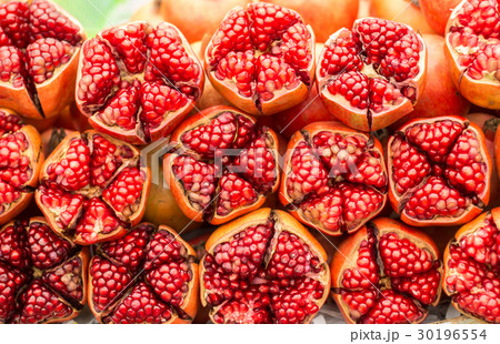 red pomegranate cutting 30196554