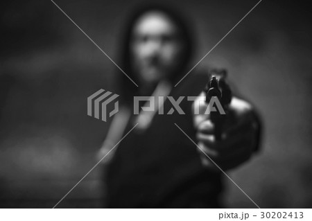 Loaded wicked criminal pulling a gun on somebody 30202413
