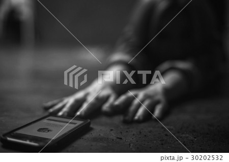 Kidnapped woman trying getting to her phone Kidnapped woman trying getting to her phone 30202532