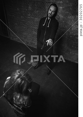 Outraged dangerous criminal making a businesswoman 30202705