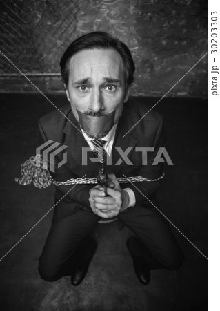 Trapped sad man begging for salvation 30203303